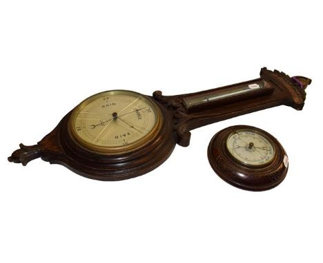 A mercury wheel barometer signed Chadburn &amp; Son, Liverpool, three aneroid barometers, and a barometer book by Edwin Banfi