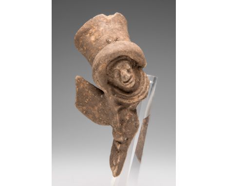 Fragment of huaco. Ecuador, pre-Columbian culture.Terracotta.Measurements: 4,5 x 14 x 5,5 cm .A huaco is a ceramic piece of d
