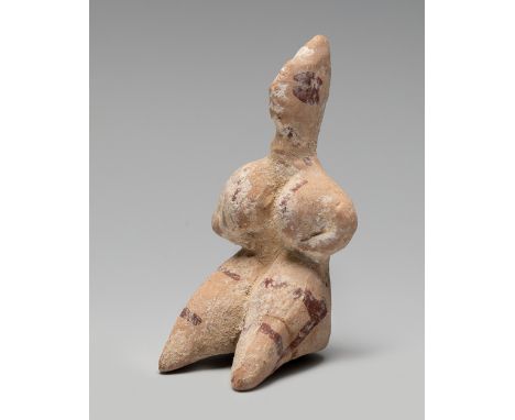 Fertility figure. Tell Halaf, Syria 3rd millennium BC.Polychrome terracotta.Measurements: 9 x 4 x 4,5 cm .Tell Halaf is an ar