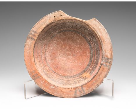 Dish. Magna Grecia, V-III centuries BC.Polychrome terracotta.Measurements: 4 x 20 cm.Dish entirely made in polychrome terraco