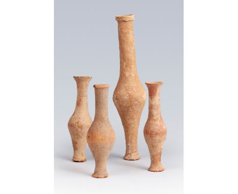 Four Roman ointments, 2nd century AD.Terracotta.Measurements: 21 cm (height of the tallest); 12 cm (height of the rest).Set o
