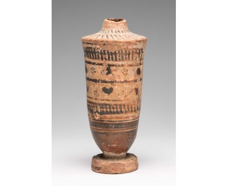 Attic lekito or lekhitos. Greece, 5th century BC.Polychrome terracotta.Measurements: 18 cm (height).Jar made in a reddish cla