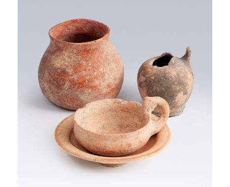 Set of four domestic utensils; Rome, 2nd-3rd century A.D.CeramicsJug, cup, guttus and plate.It presents faults in the guttus.