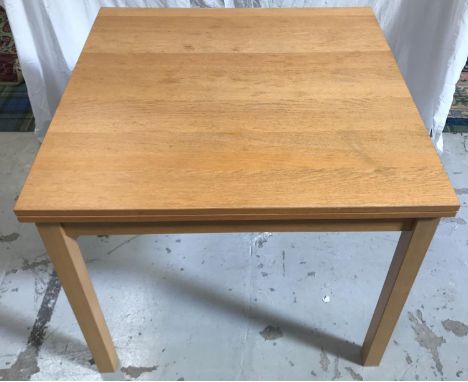 LIGHT OAK DRAWLEAF TABLEwith a plain frieze, standing on plain supports, 165.5cm extended 