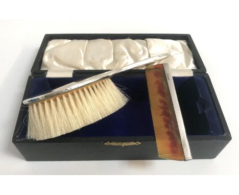 EDWARD VII SILVER BACKED HAIR BRUSHand comb, both stamped Robinson & Co Ltd, Singapore and hallmarked Birmingham 1902, cased 