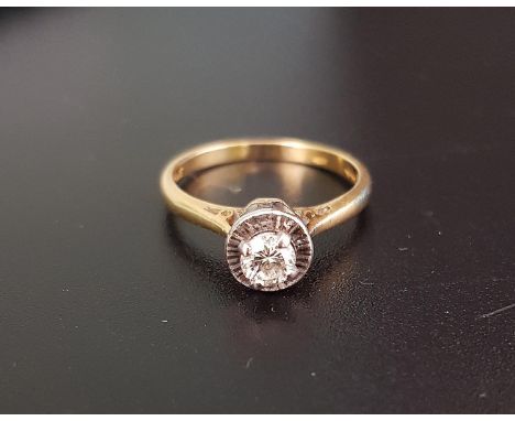 DIAMOND SOLITAIRE RINGthe round brilliant cut diamond approximately 0.25cts, on eighteen carat gold shank with textured plati