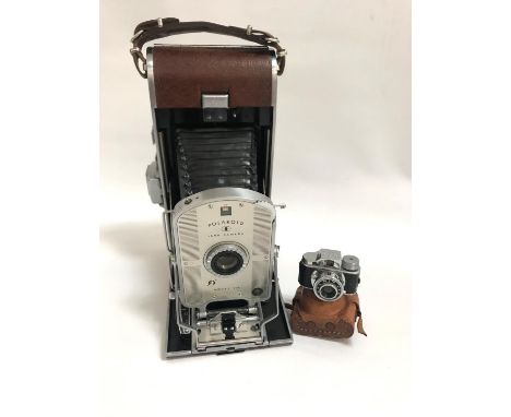 POLAROID LAND CAMERA MODEL 95Atogether with a Japanese miniature Hit Camera in leather case 