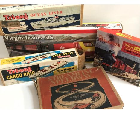 TWO BOXED TRI-ANG MODEL SHIPScomprising an ocean liner and a cargo ship; together with a boxed Virgin Trains 125 Hornby elect