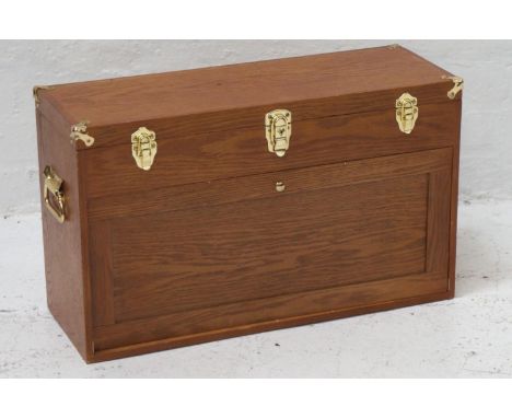 LIGHT OAK COLLECTORS CABINETwith a rectangular lift up lid with reinforced brass corners opening to reveal a green baize line