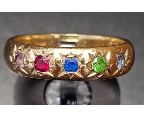 MULTI GEM SET GYPSY STYLE RINGwith flush set aquamarine, peridot, sapphire, ruby and pink topaz, on ten carat gold shank, rin