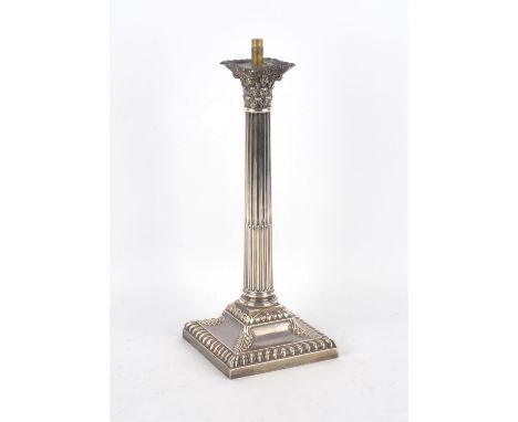Corinthian column silver candlestick by Hawksworth, Eyre & Co Ltd , later fitted as a table lamp, Sheffield 1905 32cmConditio