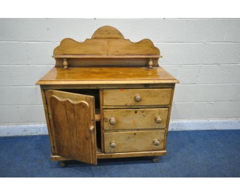 A 19TH CENTURY PINE SIDEBOARD, with raised back and shelf, a single door and three drawers, on turned feet, width 106cm x dep