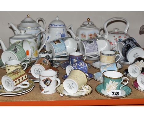 A GROUP OF WEDGWOOD AND ROYAL DOULTON COFFEE CUPS AND FIVE COMPTON AND WOODHOUSE TEAPOTS, 'The First Teapots Collection' comp