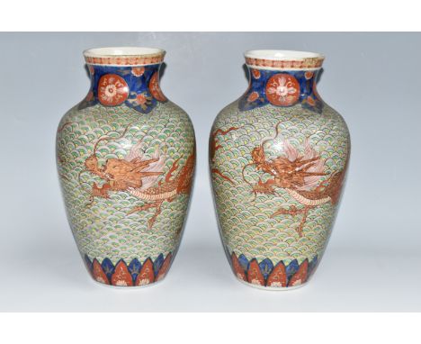 A PAIR OF LATE 19TH CENTURY / EARLY 20TH CENTURY JAPANESE IMARI PORCELAIN BALUSTER VASES, the body with green, yellow and gre