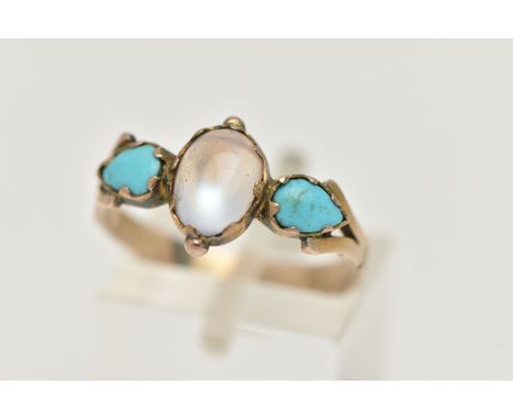 A YELLOW METAL MOONSTONE AND TURQUOISE THREE STONE RING, set with a central oval moonstone cabochon, claw collet settings wit