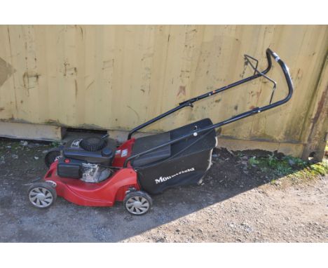 A MOUNTFIELD HP164 PETROL LAWN MOWER with grass box (priming bulb decayed but engine pulls freely, hasn't started)