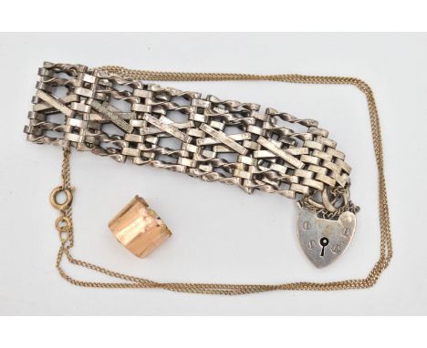 A SMALL ASSORTMENT OF ITEMS, to include a white metal gate bracelet fitted with a heart padlock clasp, stamped silver, approx