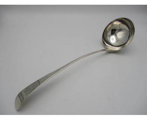 A George II silver serving ladle, London 1755, with engraved initial to the finial, weight 215 g, 34 cm long 