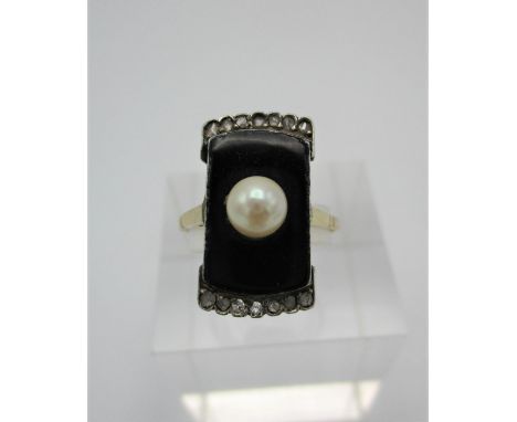 An Art Deco style diamond, enamel and pearl tablet ring, with central cultured pearl on a black enamel face with small diamon