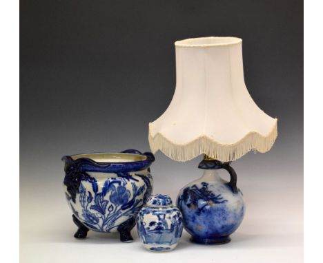 Blue and white transfer printed jardinière on three feet, a table lamp formed from a blue and white transfer printed jug, and