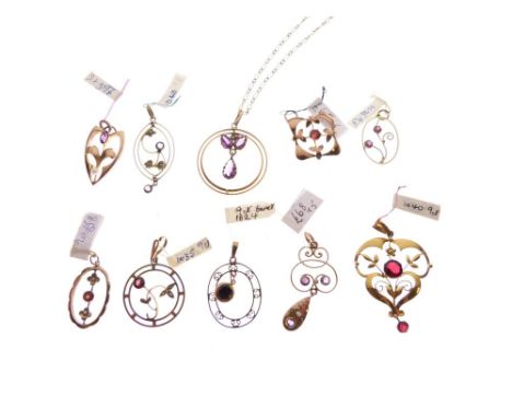Collection of amethyst and garnet set pendants, nine marked 9ct, 17.4g gross approx  