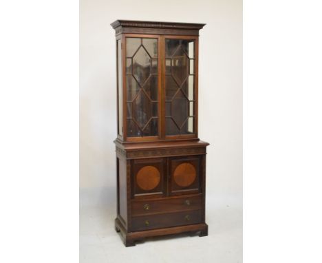 Good quality old reproduction mahogany two section bookcase, the top having astragal glazed doors, the base with two quarter 