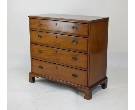 19th Century mahogany straight front chest of four graduated drawers fitted pressed brass oval handles, the top two drawers h