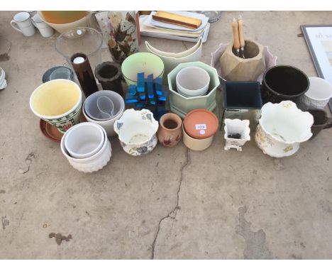 A LARGE QUANTITY OF CERAMIC AND GLASS PLANTERS AND VASES ETC 