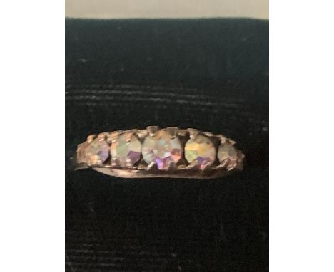 A BOXED SILVER RING MARKED 925 WITH FIVE IN LINE COLOURED STONES 