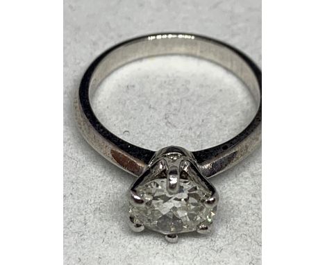 AN 18 CARAT WHITE GOLD RING WITH A 1.76 CARAT DIAMOND SOLITAIRE CLARITY SI2 COLOUR G TOTAL GOLD WEIGHT 4.6 GRAMS WITH AN AGI 