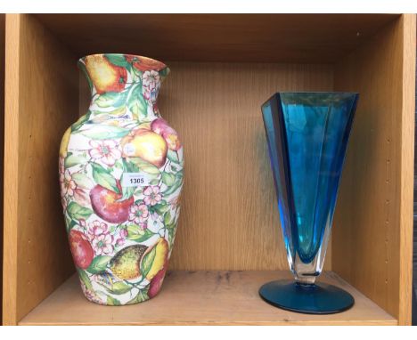 A LARGE CERAMIC VASE AND A FURTHER BLUE GLASS VASE 