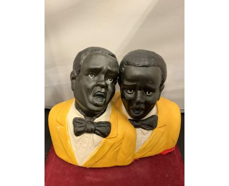 A CERAMIC FIGURE OF TWO MALE JAZZ SINGERS 