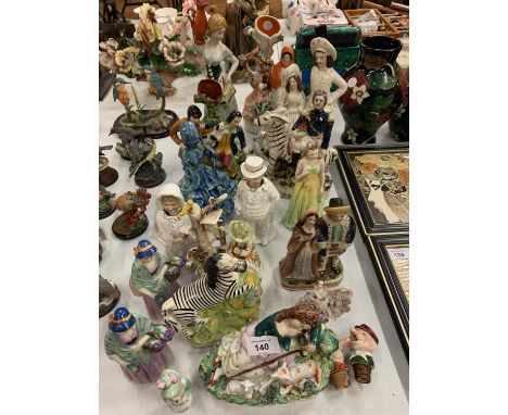 AN ASSORTMENT OF CERAMIC FIGURES TO INCLUDE STAFFORDSHIRE EXAMPLES ETC 