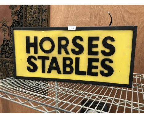 AN ILLUMINATED 'HORSES STABLES' LIGHT BOX SIGN 