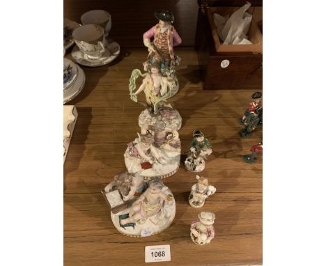 AN ASSORTMENT OF MEISSEN CERAMIC FIGURES TO INCLUDE TWO CHERUBS WITH A PAIR OF DOVES (SOME A/F) 