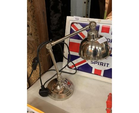 A SILVER METAL ANGLEPOISE STYLE DESK LAMP 