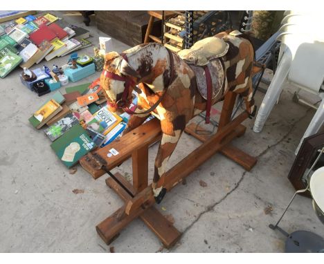A VINTAGE CHILDRENS ROCKING HORSE 