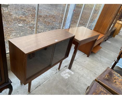 A RETRO TEAK FOLD-OVER CARD TABLE STAMPED STAVERTON 1977, G-PLAN STYLE TV STAND AND A TEAK SLIDIND DOOR BOOKCASE 