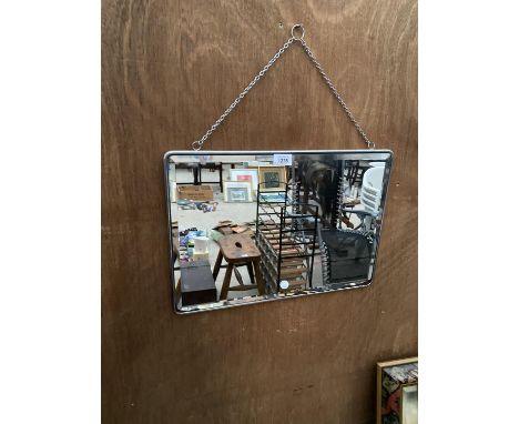 A VINTAGE METAL FRAMED WALL MIRROR WITH HANGING CHAIN 
