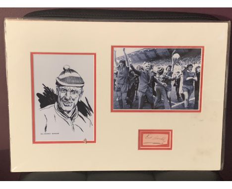 A PHOTOGRAPH AND PRINT OF BILL SHANKLEY WITH HIS AUTOGRAPH IN A MOUNT COMPLETE WITH CERTIFICATE OF AUTHENTICITY 