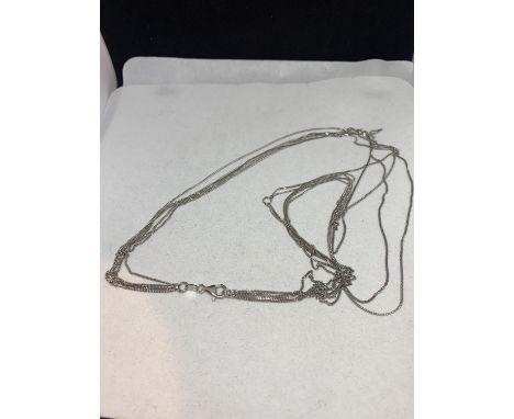 A SILVER MULTI CHAIN NECKLACE MARKED 925 