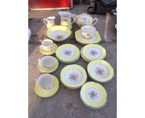 A FLORAL DESIGN TEA SERVICE 