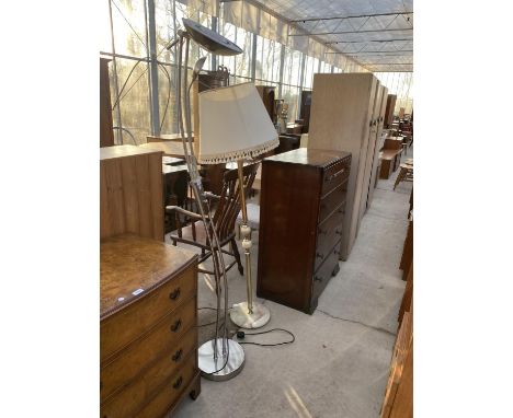 A CHROME UPLIGHTER AND AN ONYX AND BRASS STANDARD LAMP 