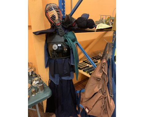 A KENDO MARTIAL ARTS UNIFORM TO INCLUDE HELMET AND PADS ETC 