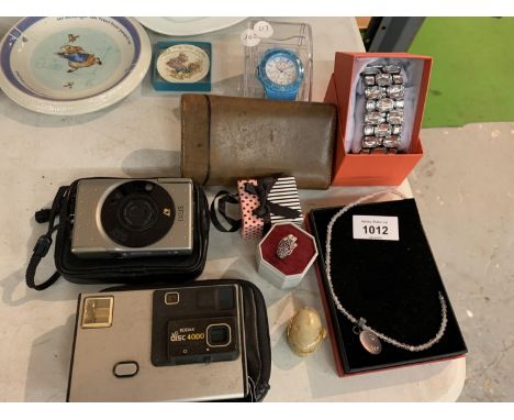 AN ASSORTMENT OF ITEMS TO INCLUDE TWO CAMERAS, A WRISTWATCH AND A WIDE BANGLE ETC 