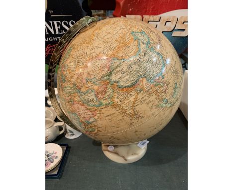 A WORLD GLOBE WITH AN INTERNAL LIGHT BELIEVED IN WORKING ORDER BUT NO WARRANTY 