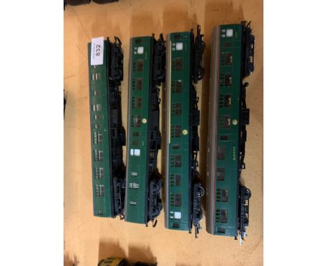 FOUR GREEN PASSENGER CARRIAGES TO INCLUDE A BUFFET CART ETC 