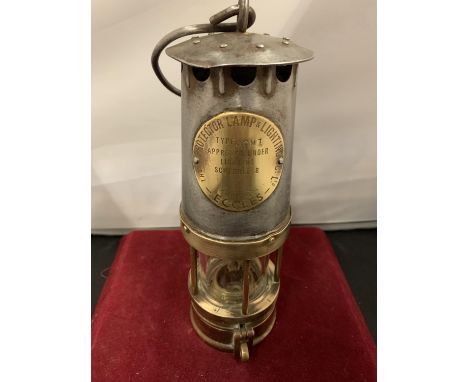 A MINER'S TIN AND BRASS LAMP 