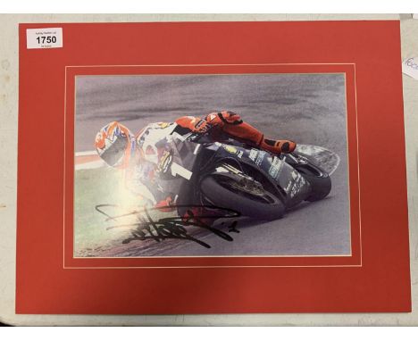 A CARD MOUNTED AND SIGNED COLOUR PRINT OF CARL FOGGARTY COMPLETE WITH CERTIFICATE OF AUTHENTICITY 