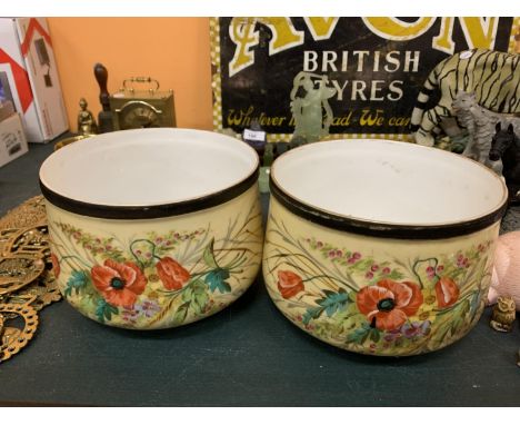 A PAIR OF DECORATIVE CERAMIC PLANT POTS 
